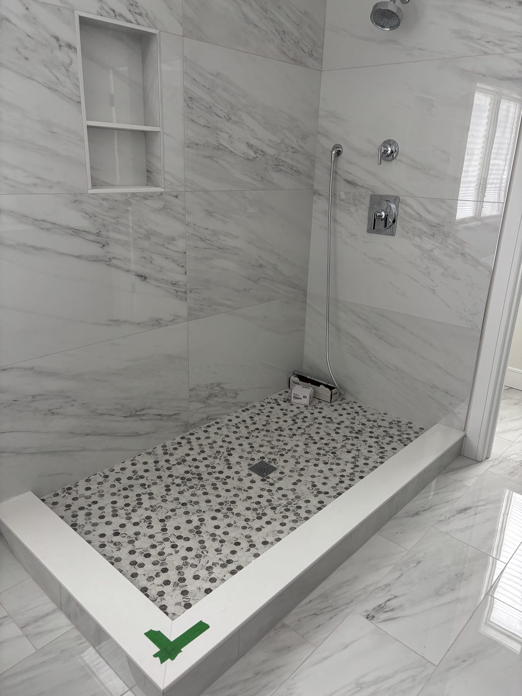 Glass shower enclosure