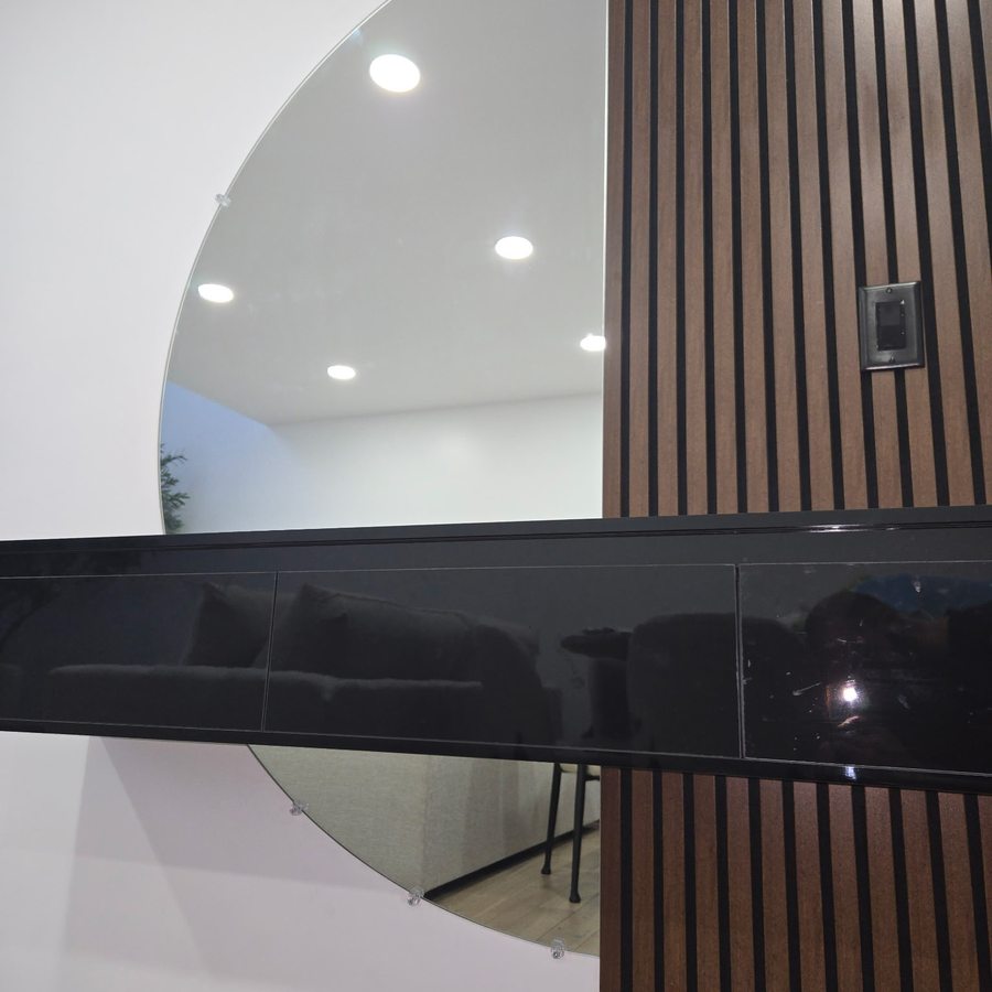 Glossy black back-painted glass, close up