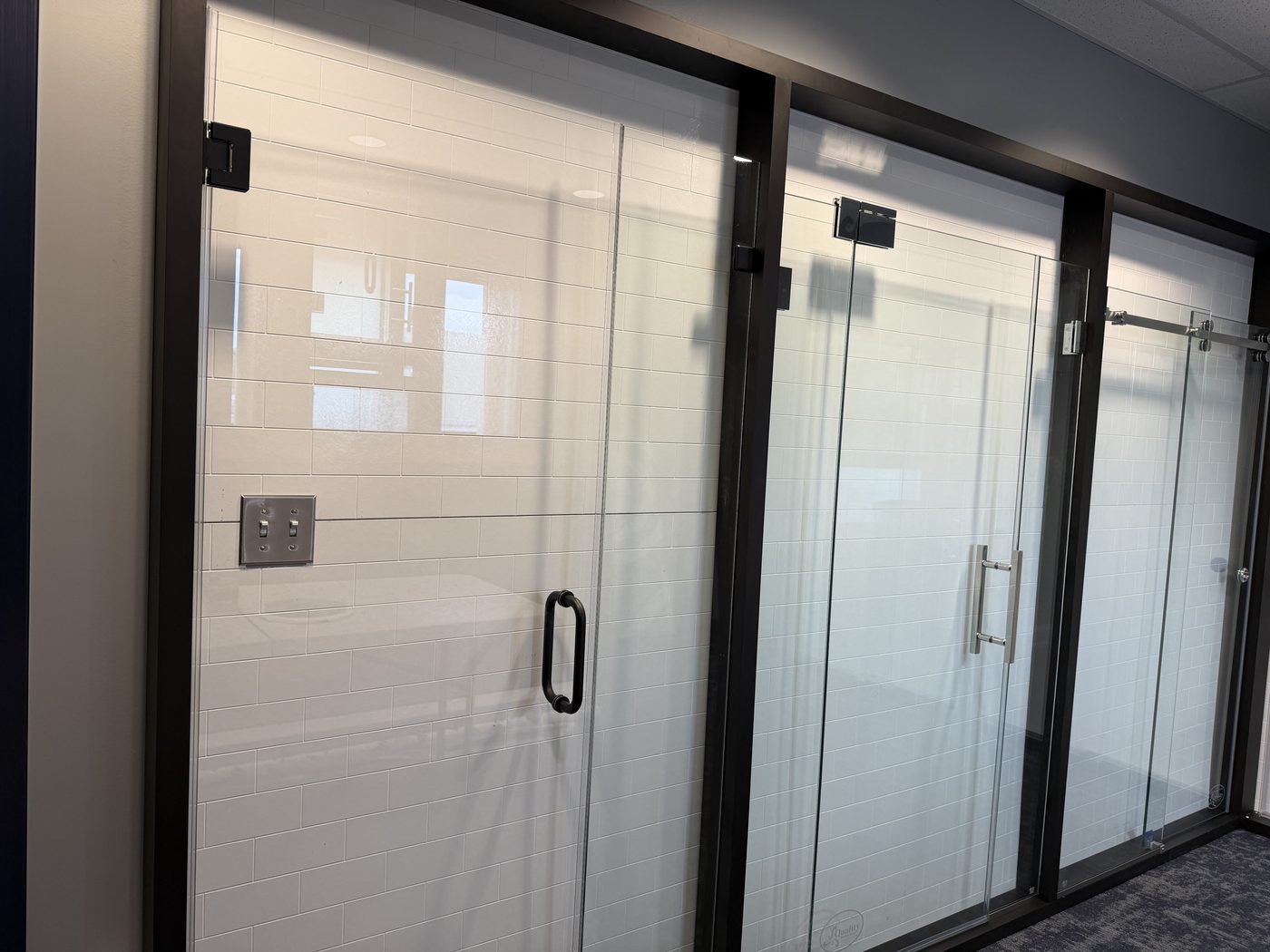 Black-framed glass office partition doors